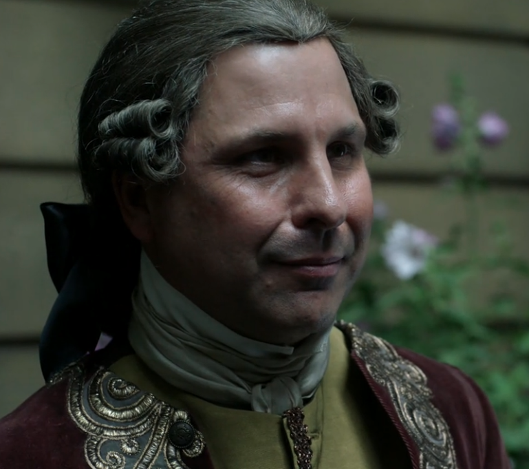 Magnus, Jared’s head butler, somberly welcomes Claire back from L'Hôpital des Anges in Outlander Season 2