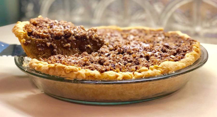 Praline Pumpkin Pie with lifted slice