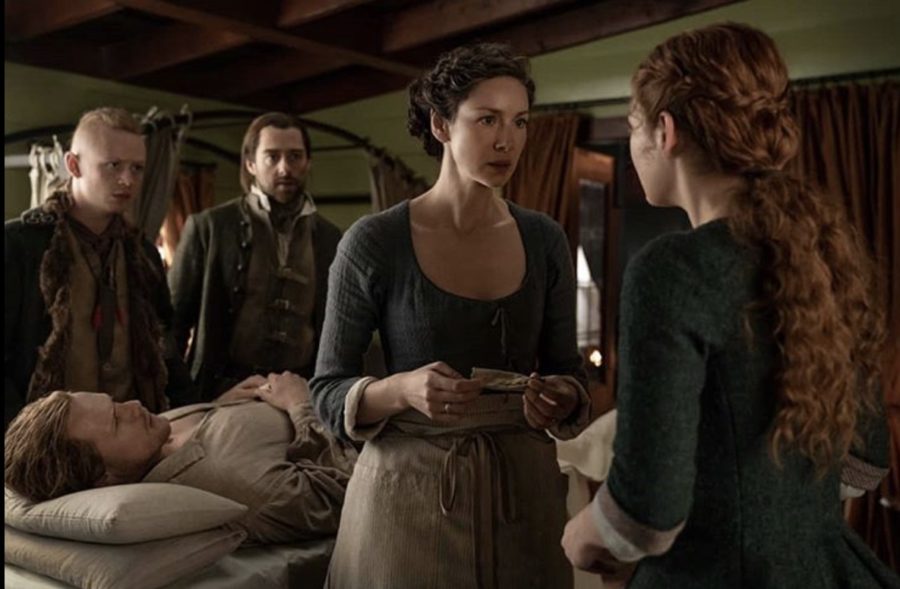 claire trying to save Jamie in outlander season 5