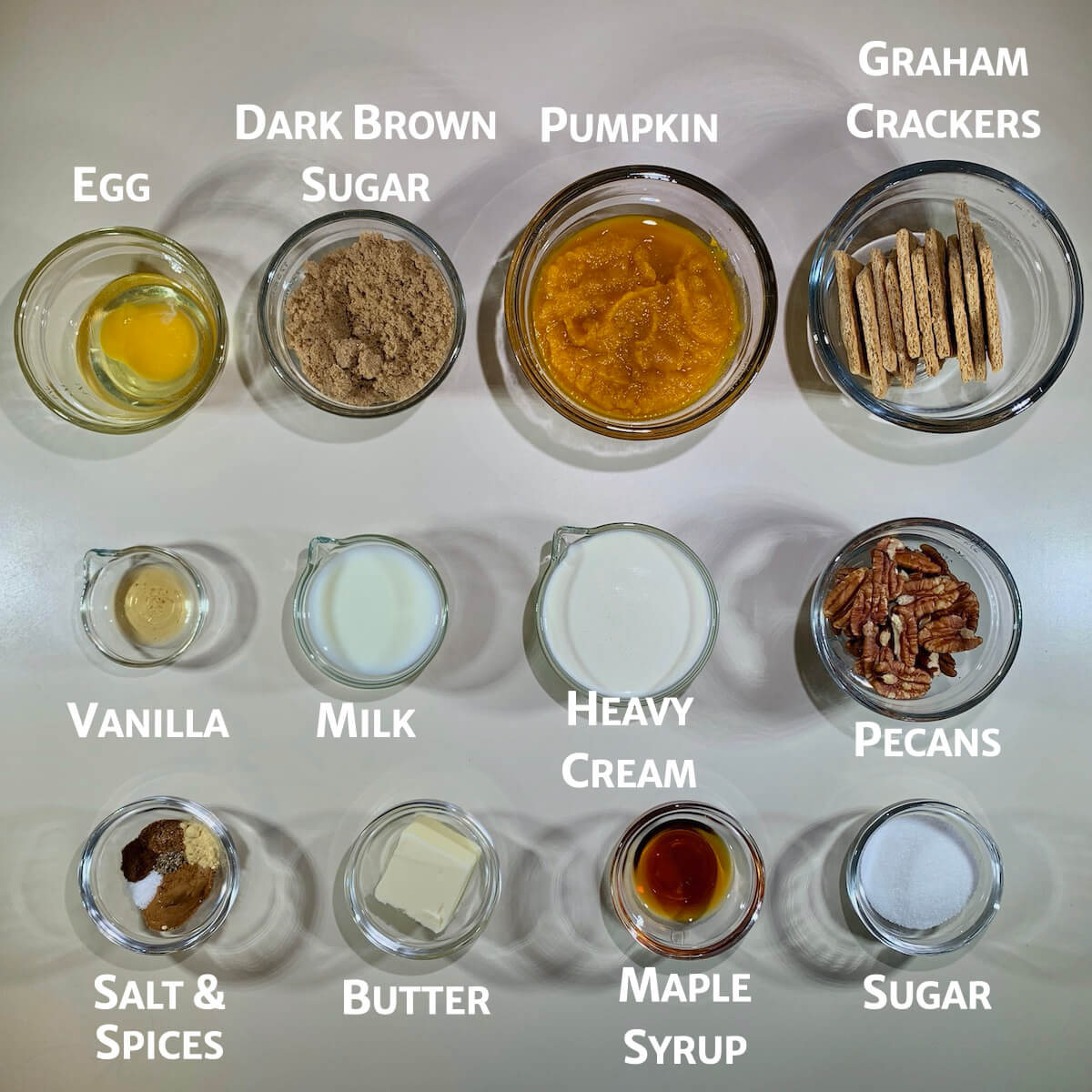 Praline Pumpkin Pie ingredients from overhead marked