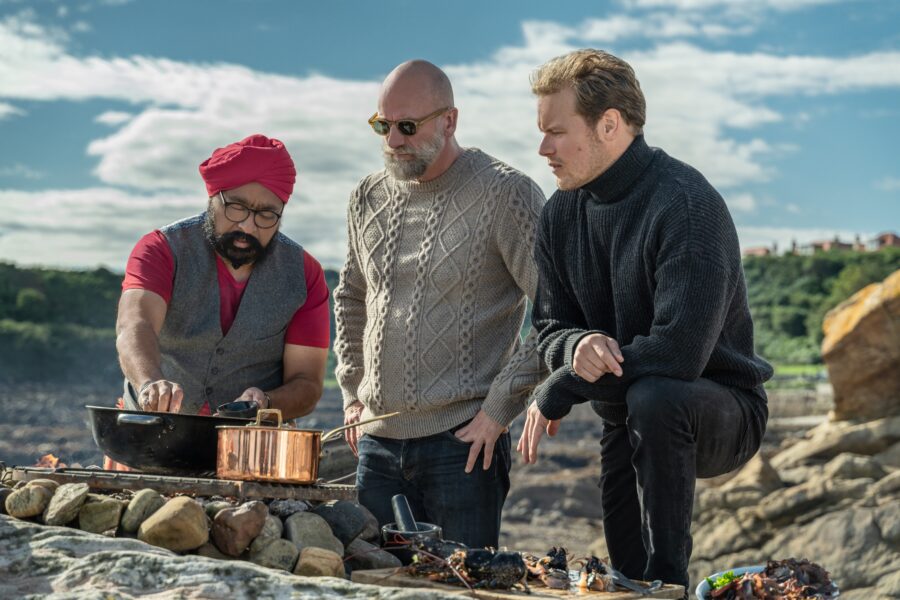 men in kilts cooking