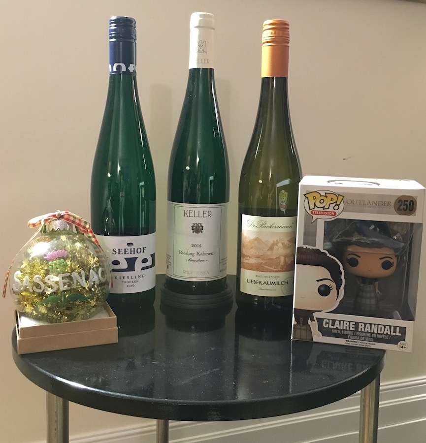 Rhenish wine lineup in bottles with Outlander items
