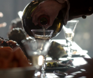 Rhenish wine being poured into glass in Outlander STARZ Season 1
