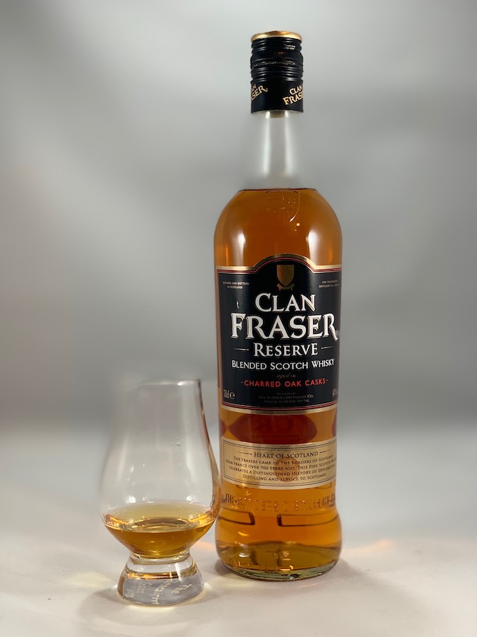 Clan Fraser Reserve in bottle with pour in glass
