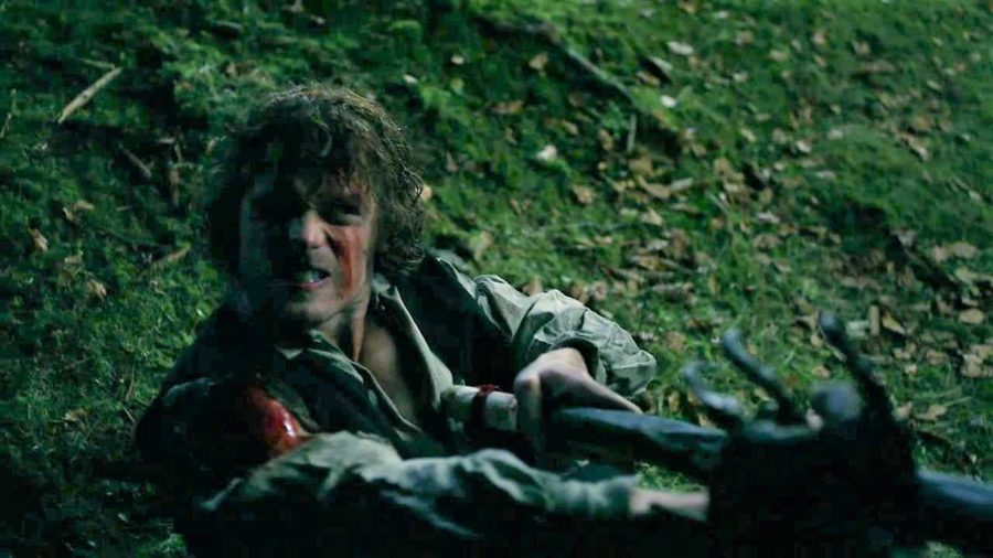 top 10 musical moments in outlander season 4, jamie fighting the bear in outlander