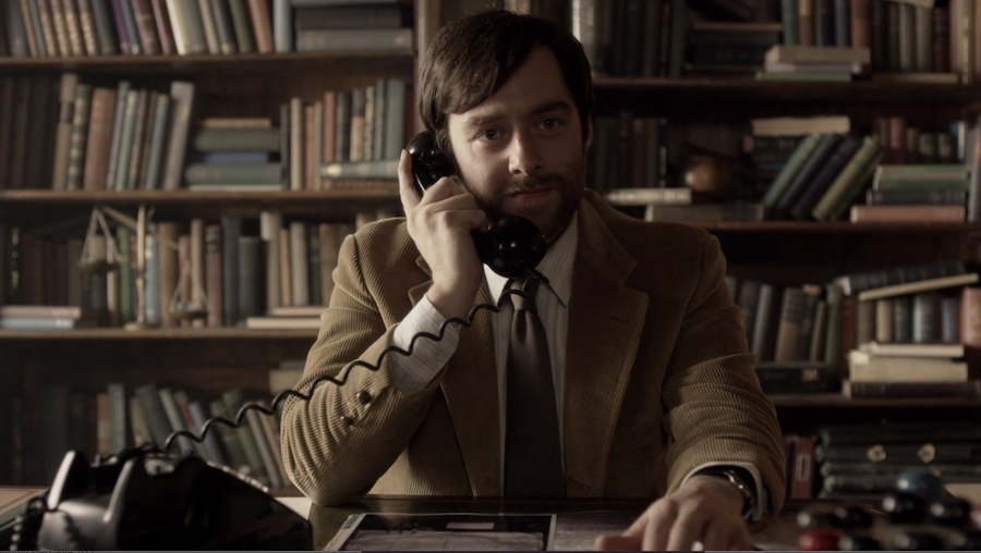 Outlander S4 On Common Ground Roger at desk on phone