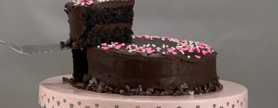 port wine cake on stand with slide lifted wide