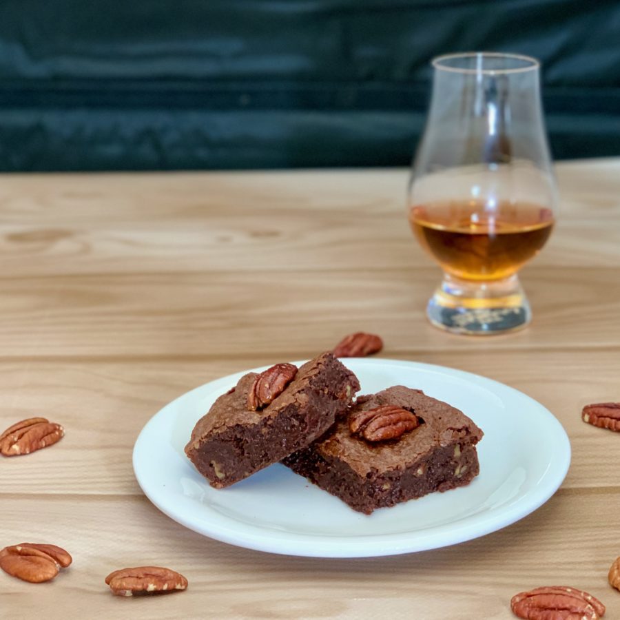 Candied Pecan Brownies plated with scotch glass closeup