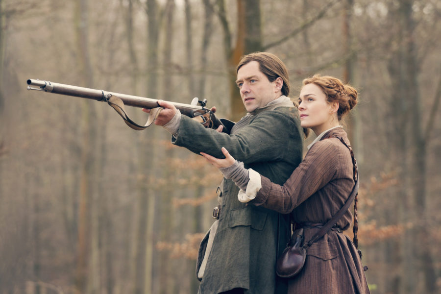 brianna teaching roger to shoot