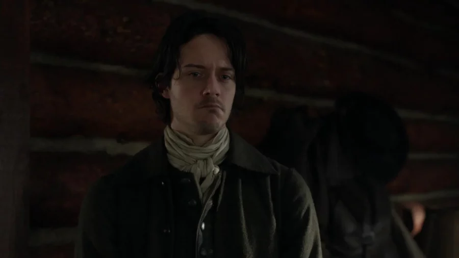 Fergus looking drunk and pensive.