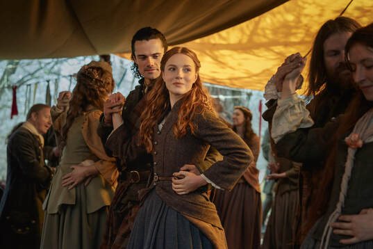 what is the needfire in Blood of My Blood